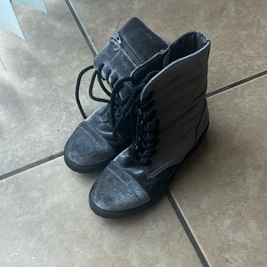 Gray suede ankle booties with thick black laces, zipper and slight heel